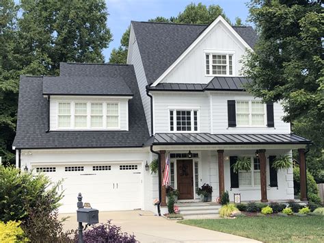 brick houses with metal roofs|white house black metal roof.